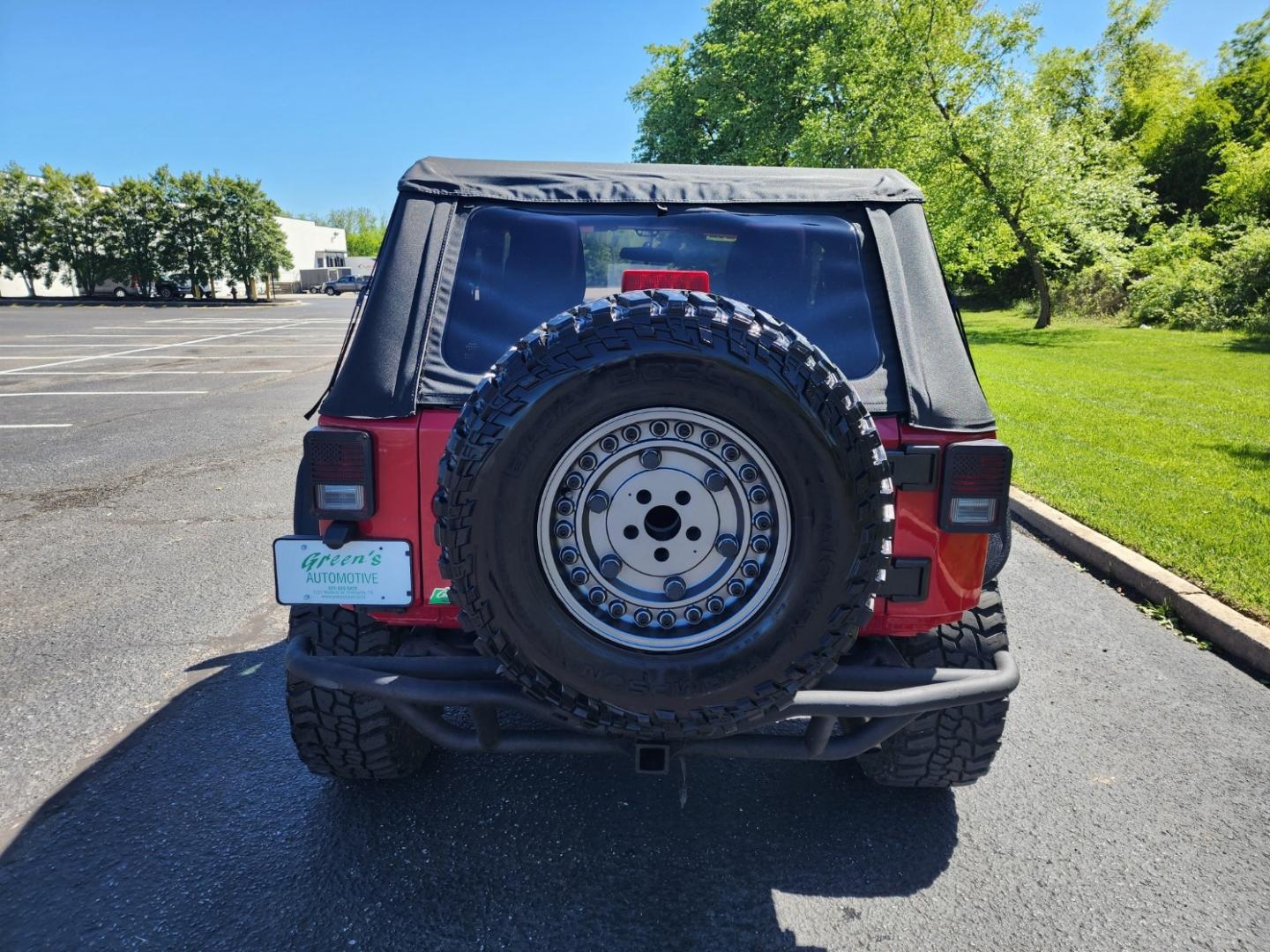 2012 RED /Black Jeep Wrangler Sport 4WD (1C4AJWAG6CL) with an 3.6L V6 DOHC 24V FFV engine, Automatic transmission, located at 1221 Madison St., Shelbyville, TN, 37160, (931) 680-9439, 0.000000, 0.000000 - Photo#2
